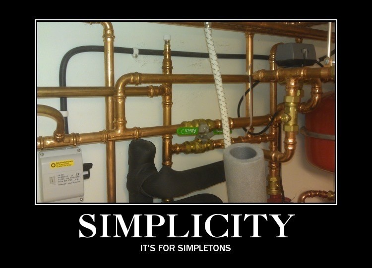 A picture of the plumbing for my heating system with the caption: Simplicity - It's for simpletons.